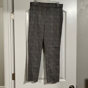 Black and white ankle business casual pants elastic waist size 8. Lightly worn.